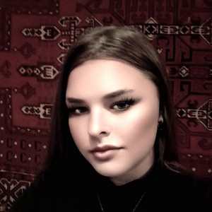 Тая